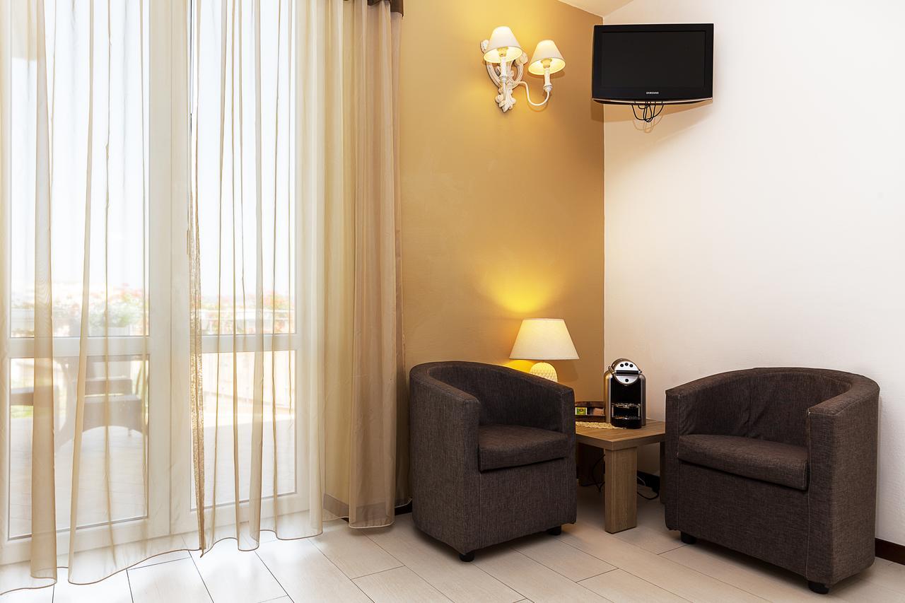 Le Residenze Del Centro Aparthotel Olbia Buitenkant foto