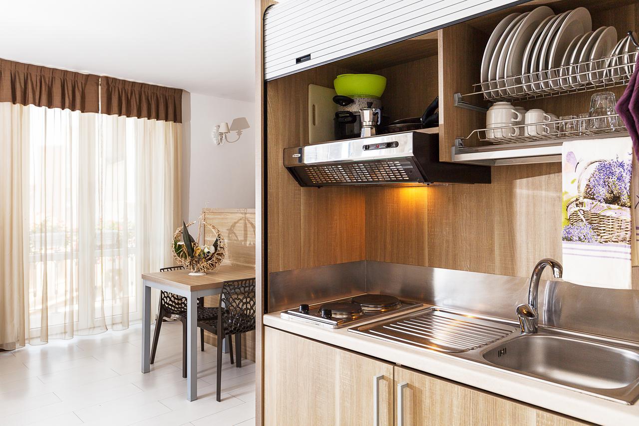 Le Residenze Del Centro Aparthotel Olbia Buitenkant foto