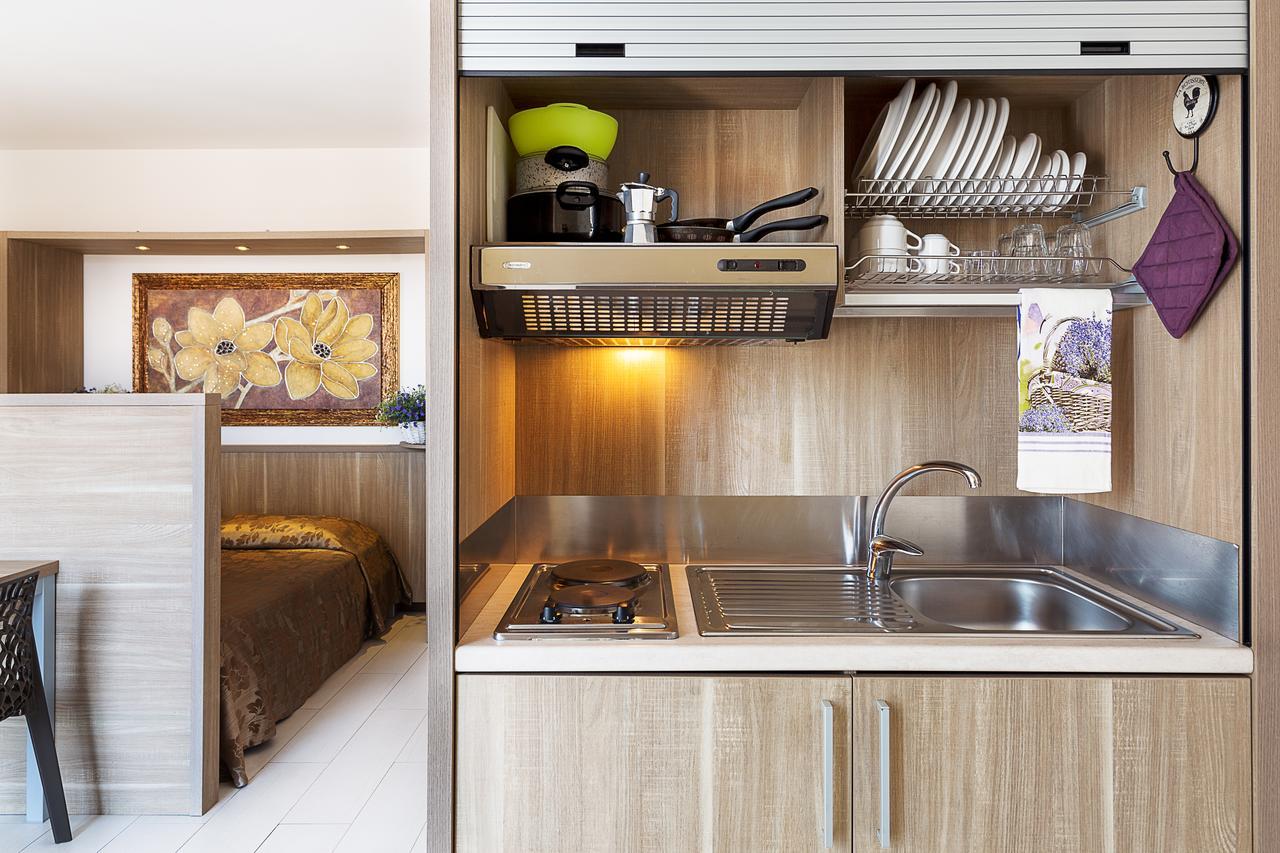 Le Residenze Del Centro Aparthotel Olbia Buitenkant foto