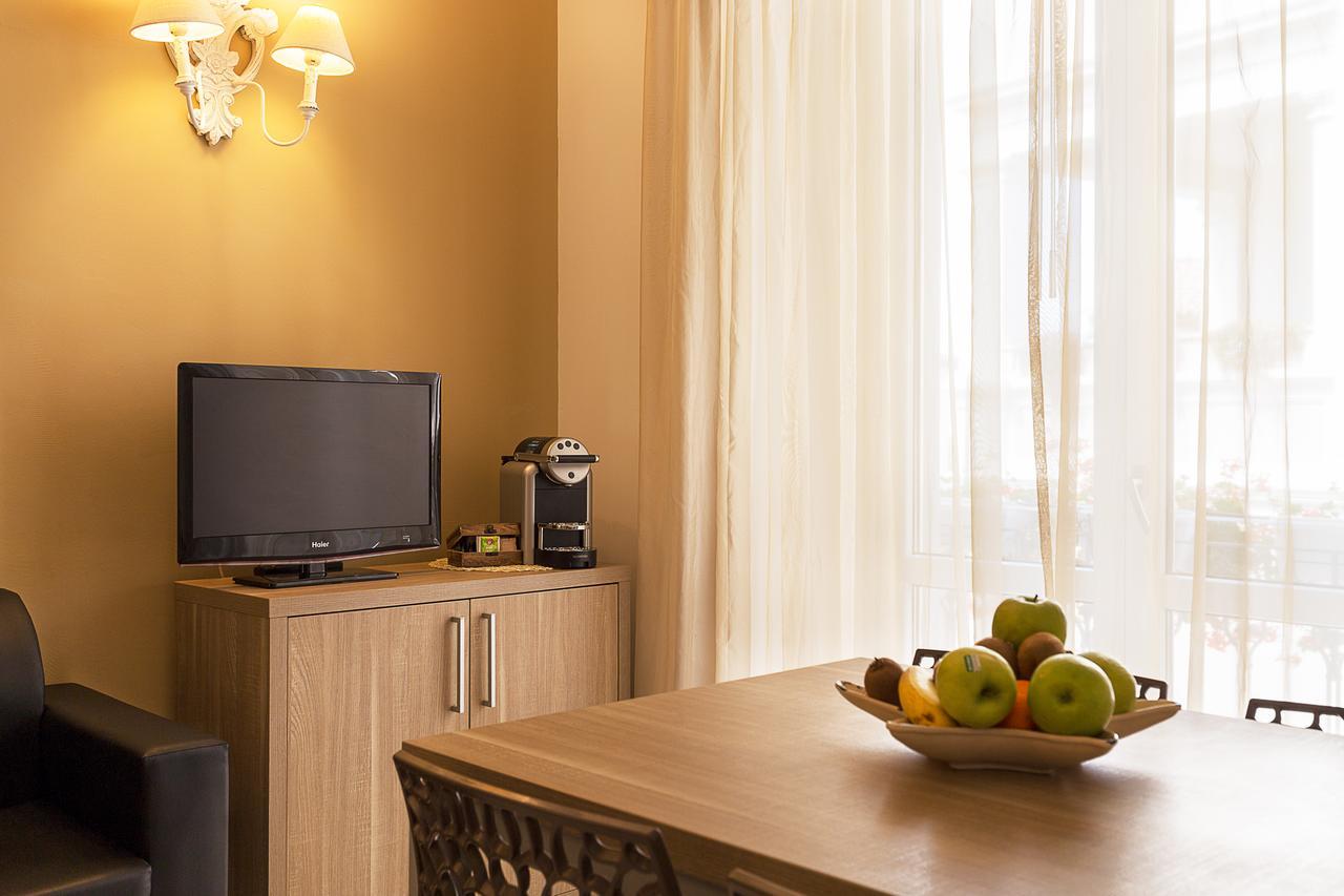 Le Residenze Del Centro Aparthotel Olbia Buitenkant foto
