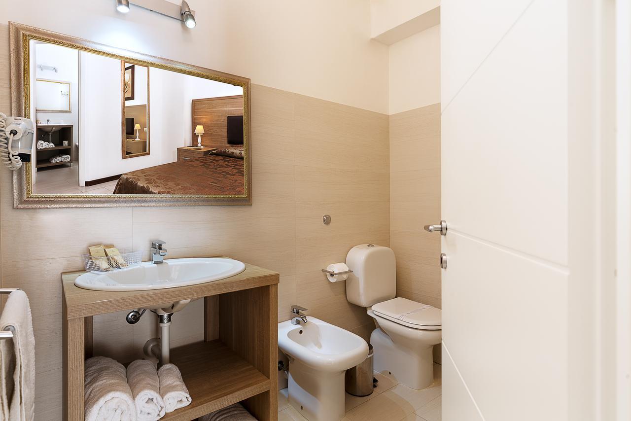 Le Residenze Del Centro Aparthotel Olbia Buitenkant foto
