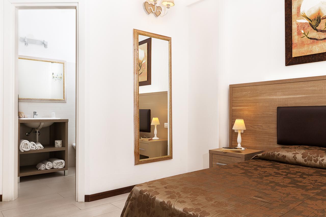 Le Residenze Del Centro Aparthotel Olbia Buitenkant foto
