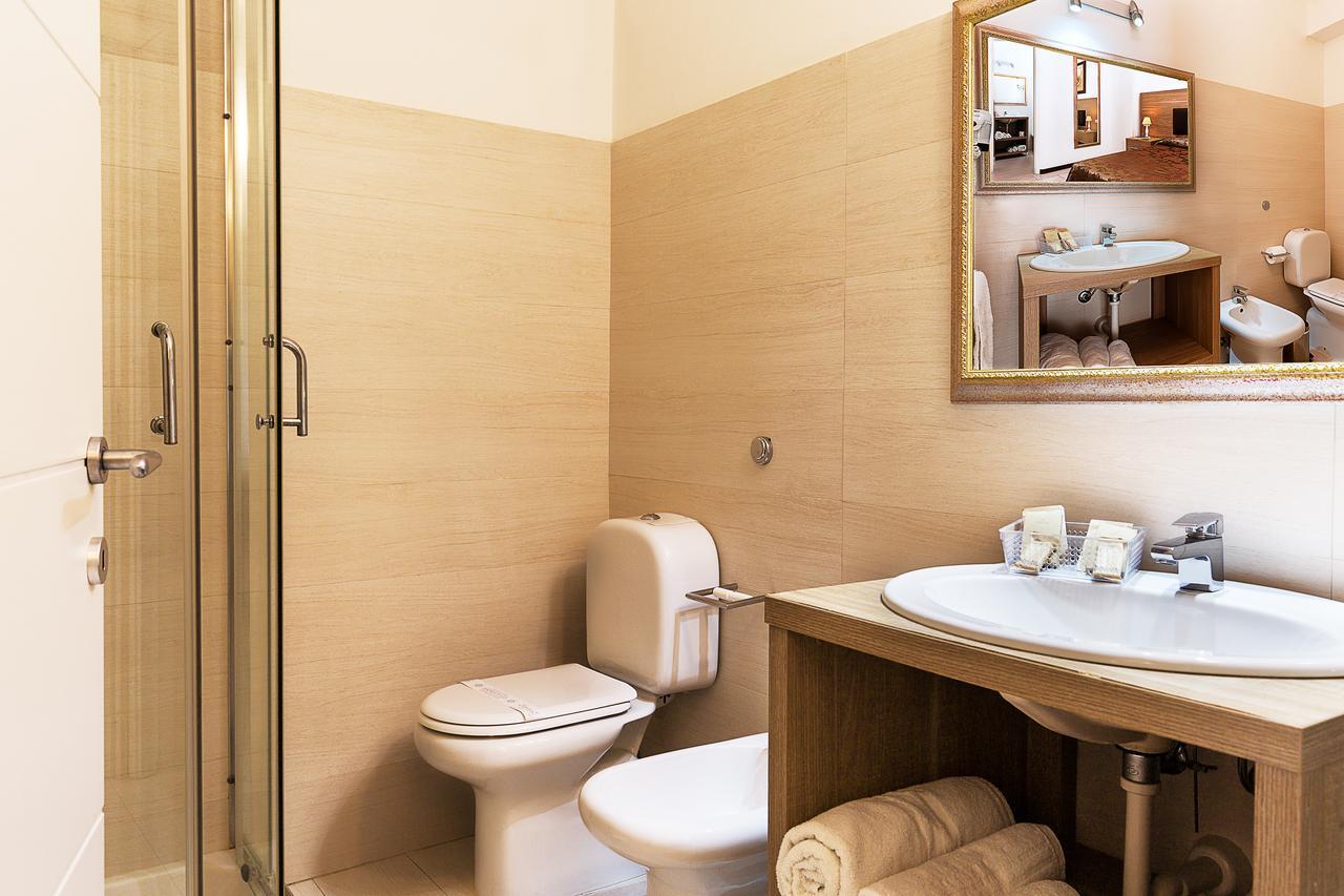 Le Residenze Del Centro Aparthotel Olbia Buitenkant foto