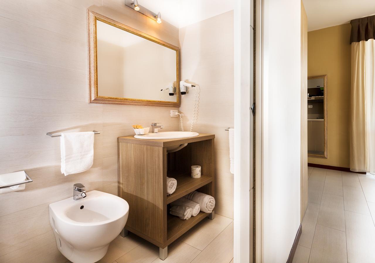 Le Residenze Del Centro Aparthotel Olbia Buitenkant foto