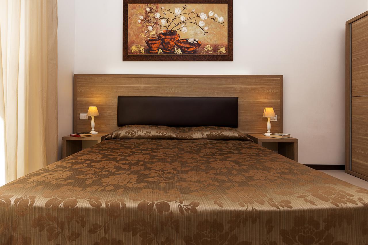 Le Residenze Del Centro Aparthotel Olbia Buitenkant foto