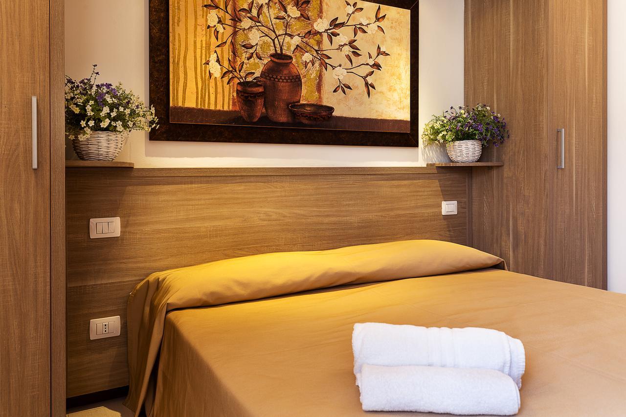 Le Residenze Del Centro Aparthotel Olbia Buitenkant foto