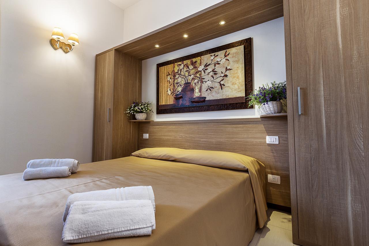 Le Residenze Del Centro Aparthotel Olbia Buitenkant foto