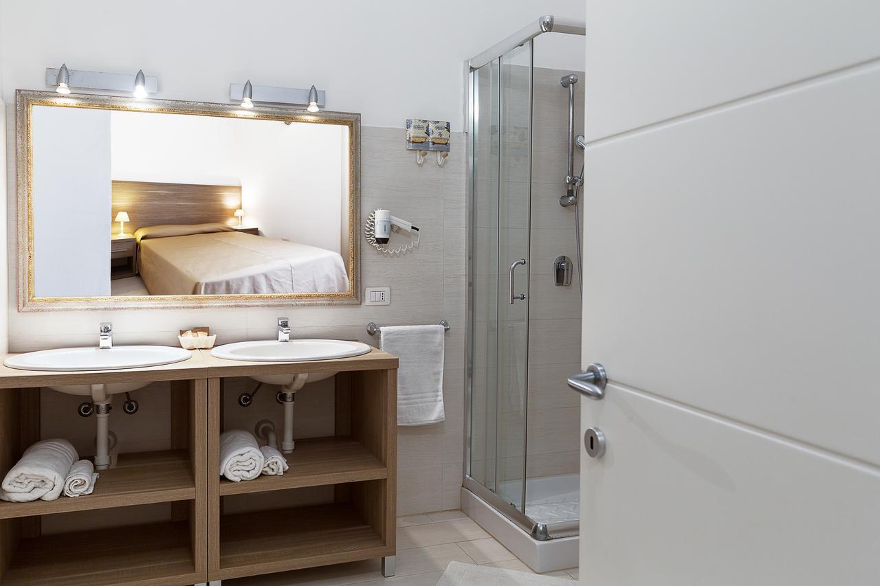 Le Residenze Del Centro Aparthotel Olbia Buitenkant foto