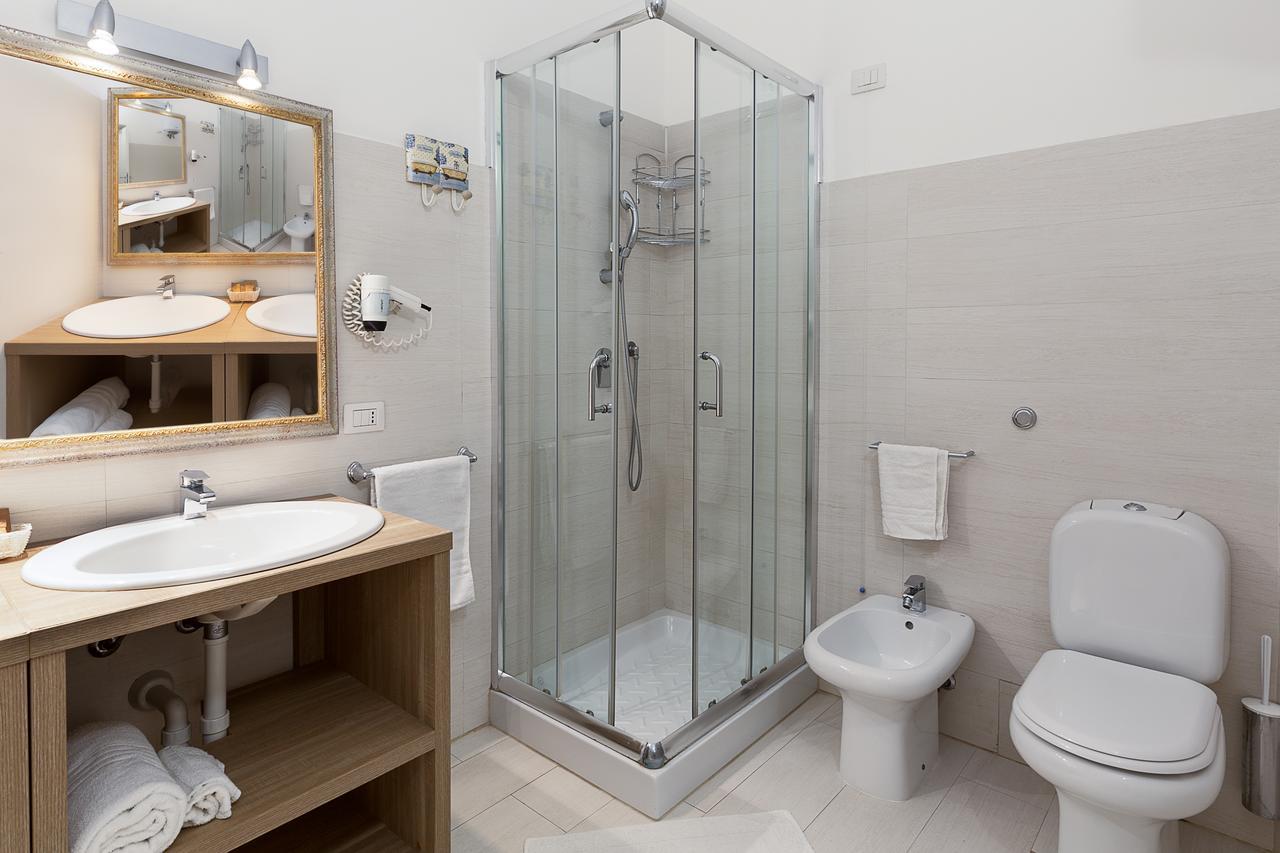 Le Residenze Del Centro Aparthotel Olbia Buitenkant foto