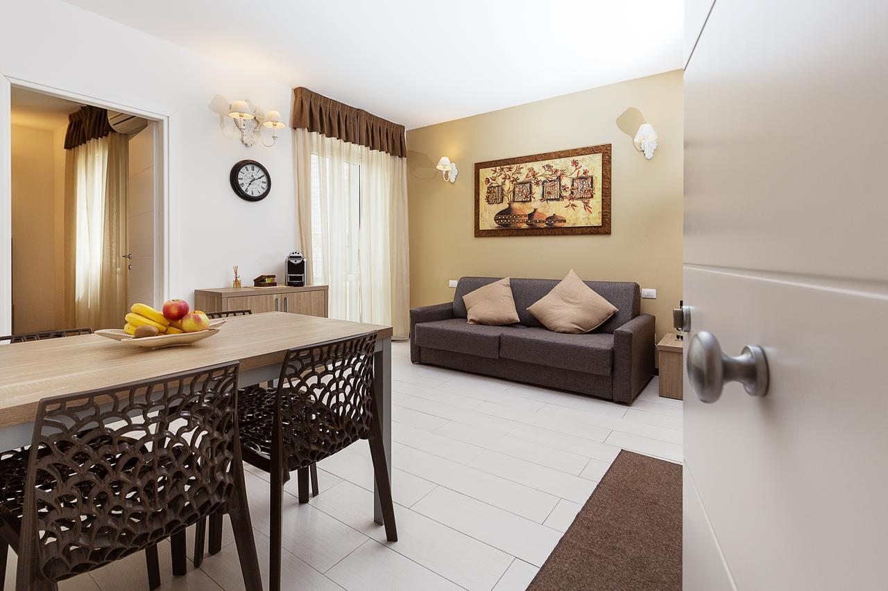 Le Residenze Del Centro Aparthotel Olbia Buitenkant foto