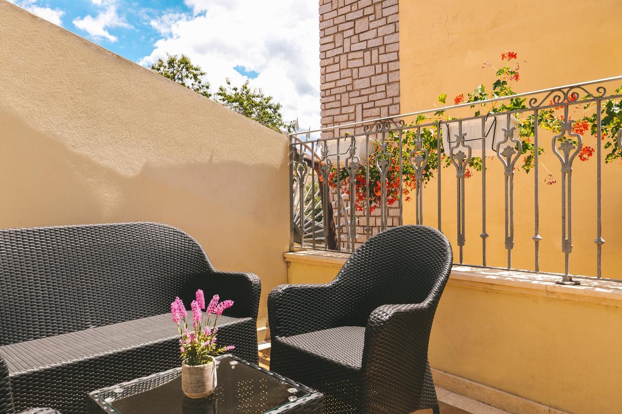 Le Residenze Del Centro Aparthotel Olbia Buitenkant foto