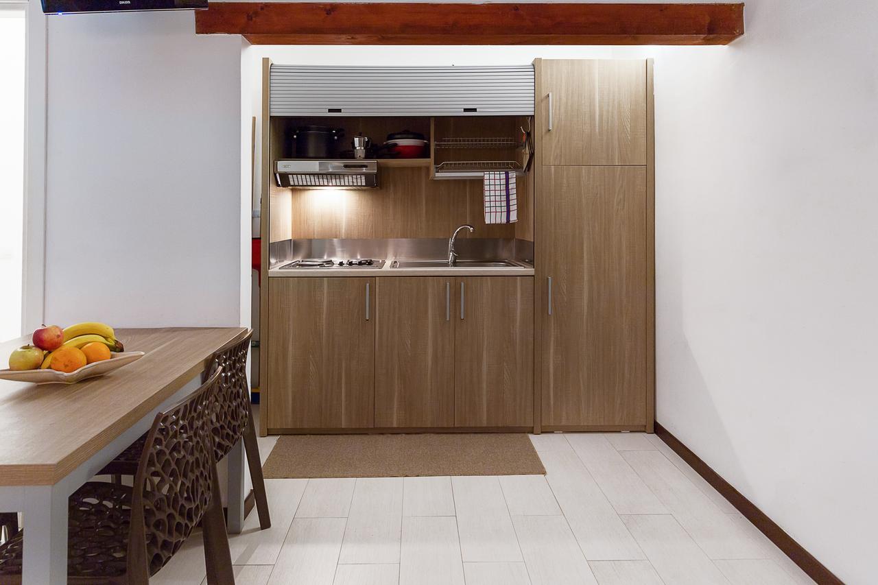 Le Residenze Del Centro Aparthotel Olbia Buitenkant foto