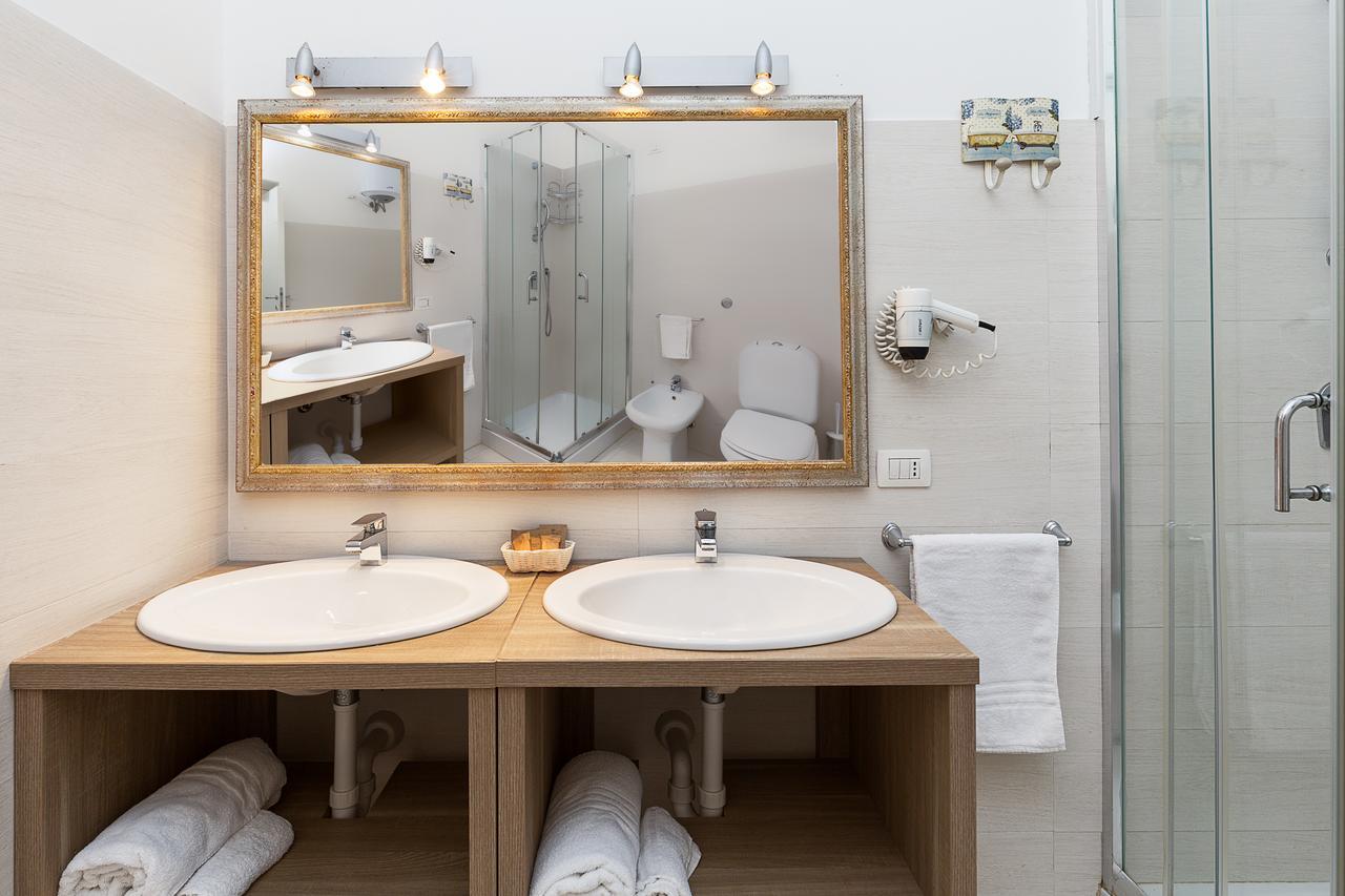 Le Residenze Del Centro Aparthotel Olbia Buitenkant foto
