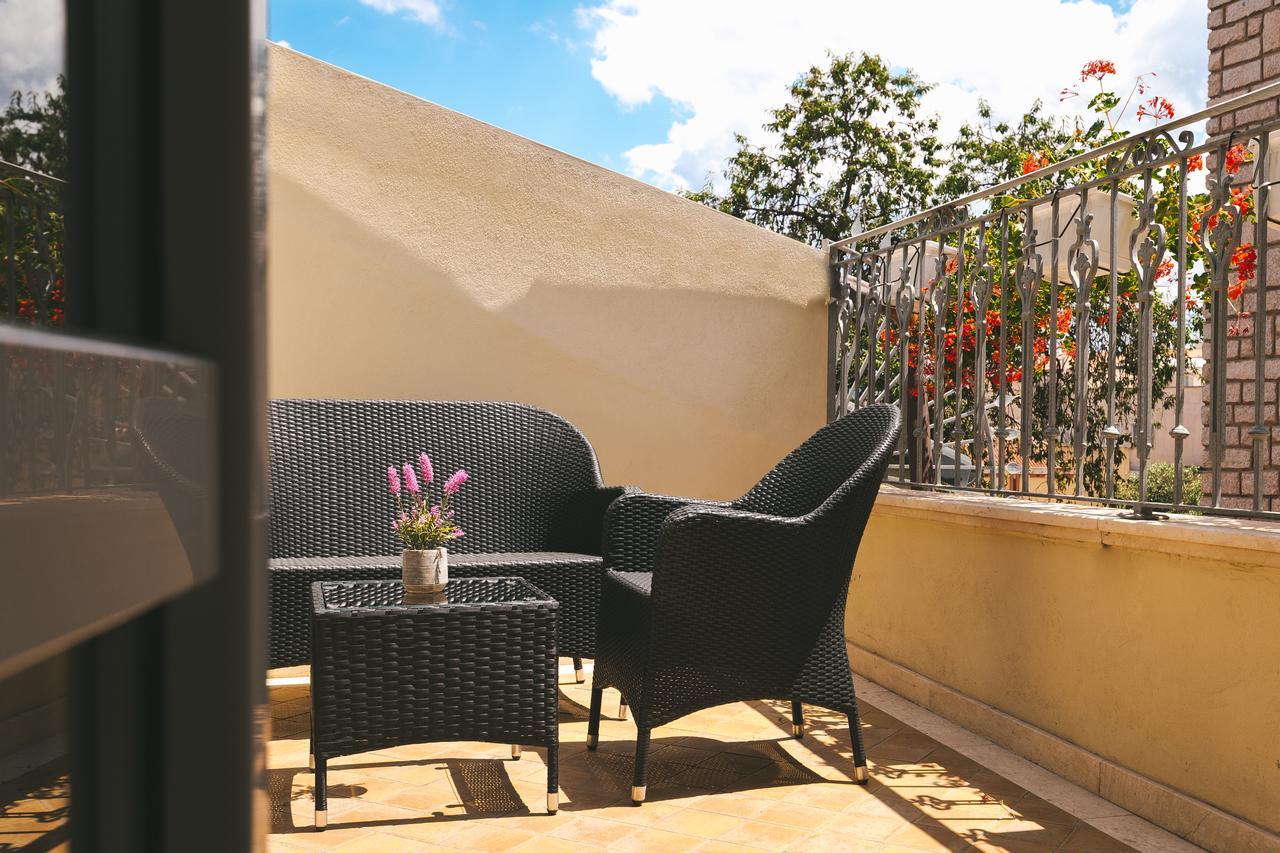 Le Residenze Del Centro Aparthotel Olbia Buitenkant foto