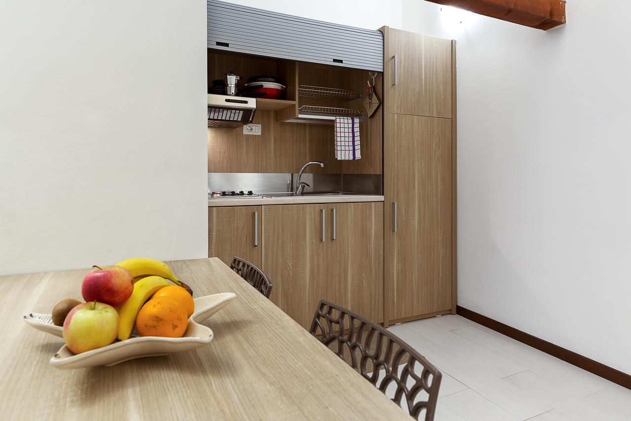 Le Residenze Del Centro Aparthotel Olbia Buitenkant foto