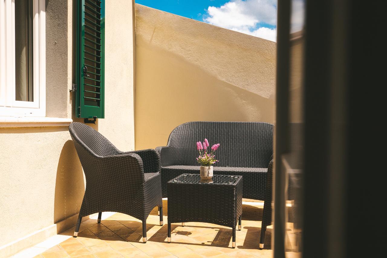Le Residenze Del Centro Aparthotel Olbia Buitenkant foto