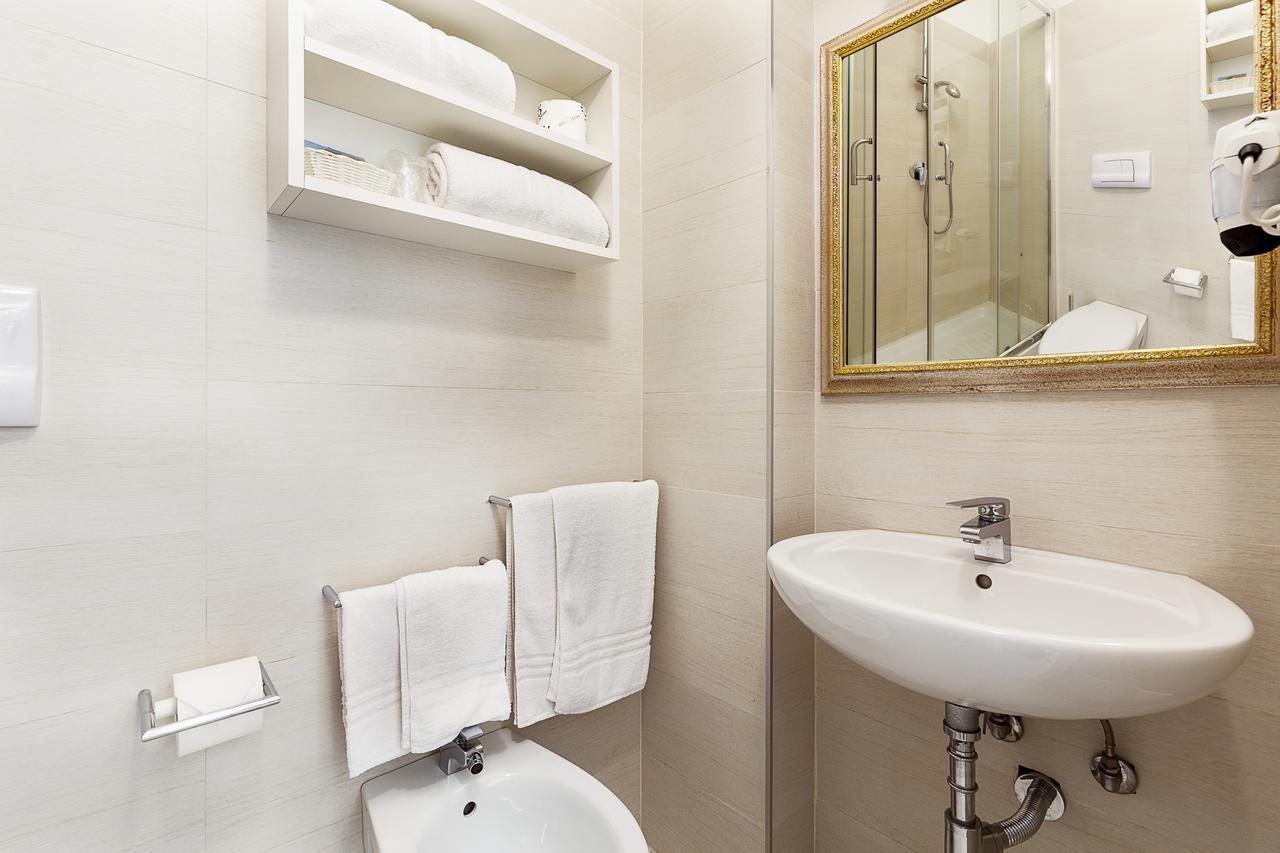 Le Residenze Del Centro Aparthotel Olbia Buitenkant foto
