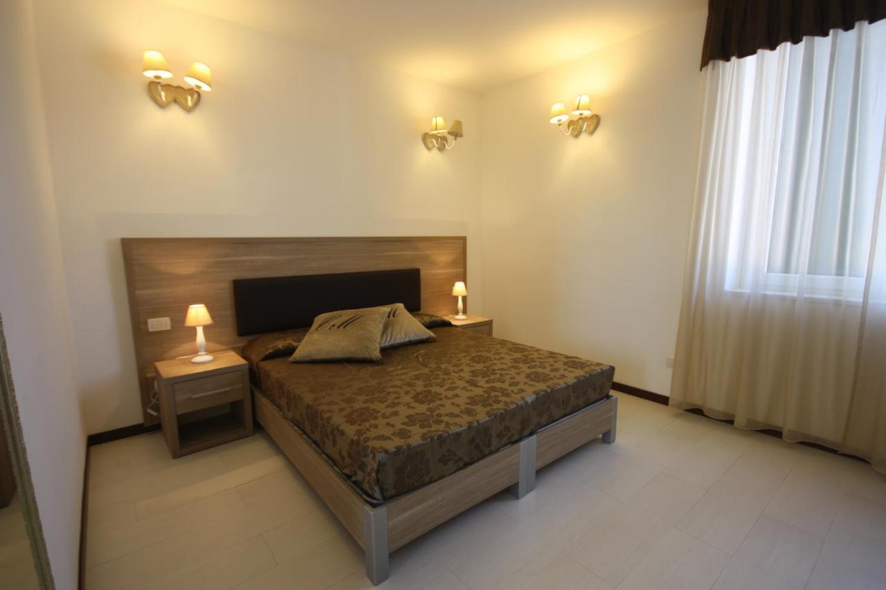 Le Residenze Del Centro Aparthotel Olbia Kamer foto